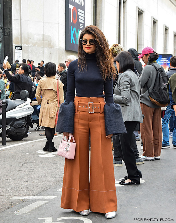 Paris style autumn, Paris Fashion Week Nina Tiari street style look, rust wide leg trousers and bell sleeve turtleneck, photo by peopleandstyles.com