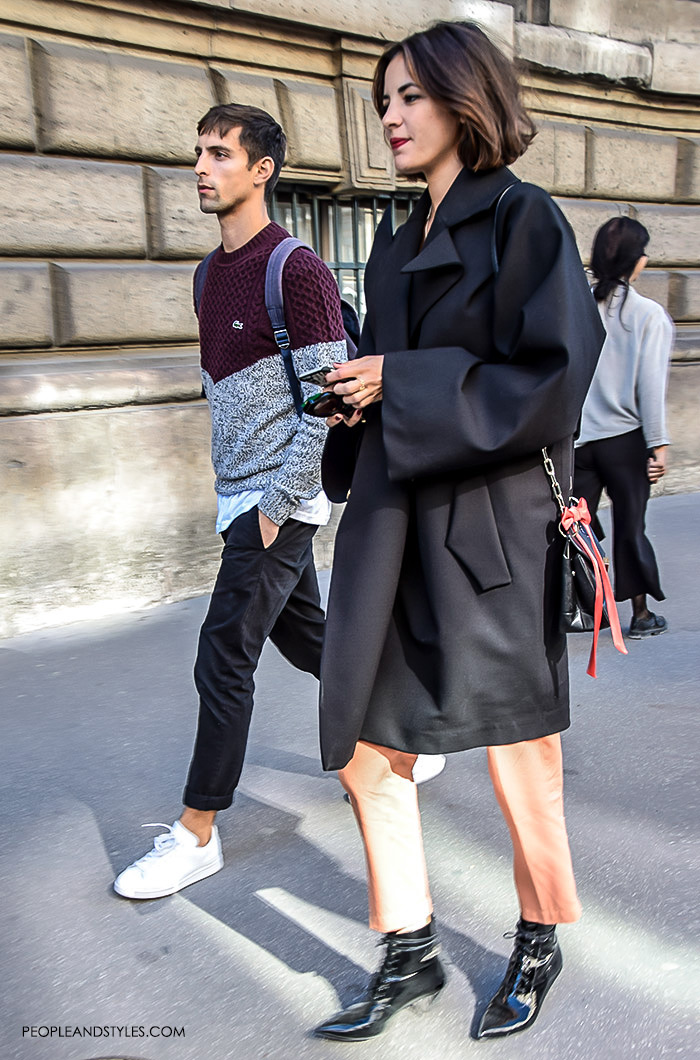 What urban couples are wearing, what are people wearing in paris? street style Paris, male black grey clothing style, White sneakers with black classic pants, sweater layered over white shirt outfit Lacoste men's fashion pintrest