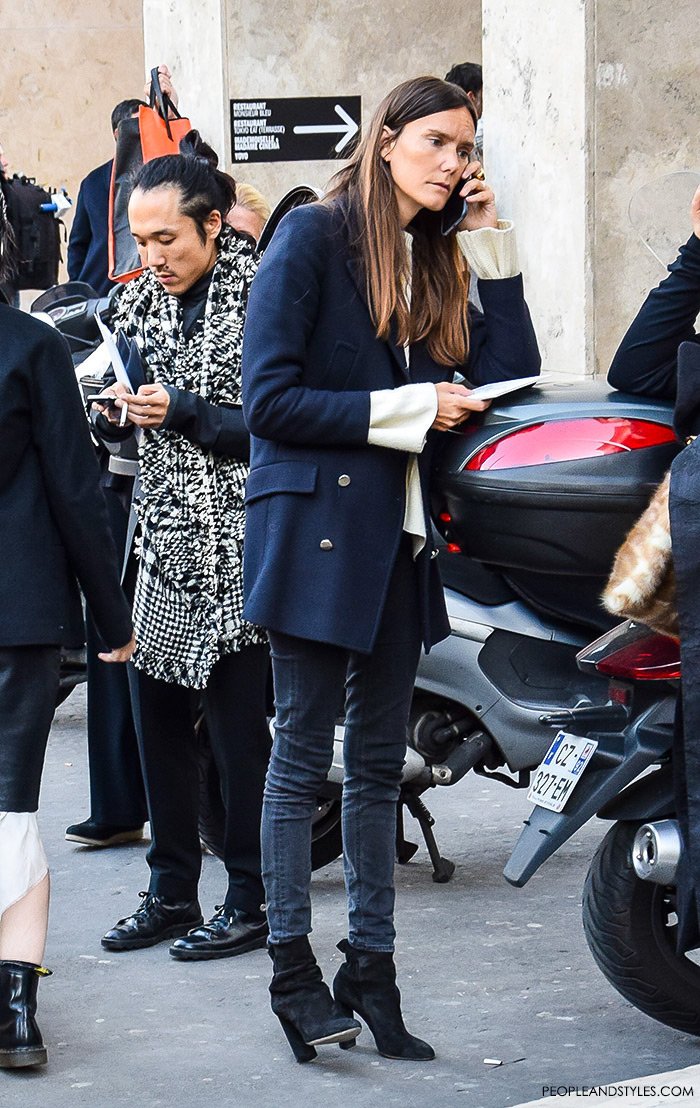 How to wear a peacoat, women's fashion, Paris Fashion Week street style outfit, editor Vogue Paris wearing grey skinny jeans and a pea cote with white loose jumper and high heel ankle boots