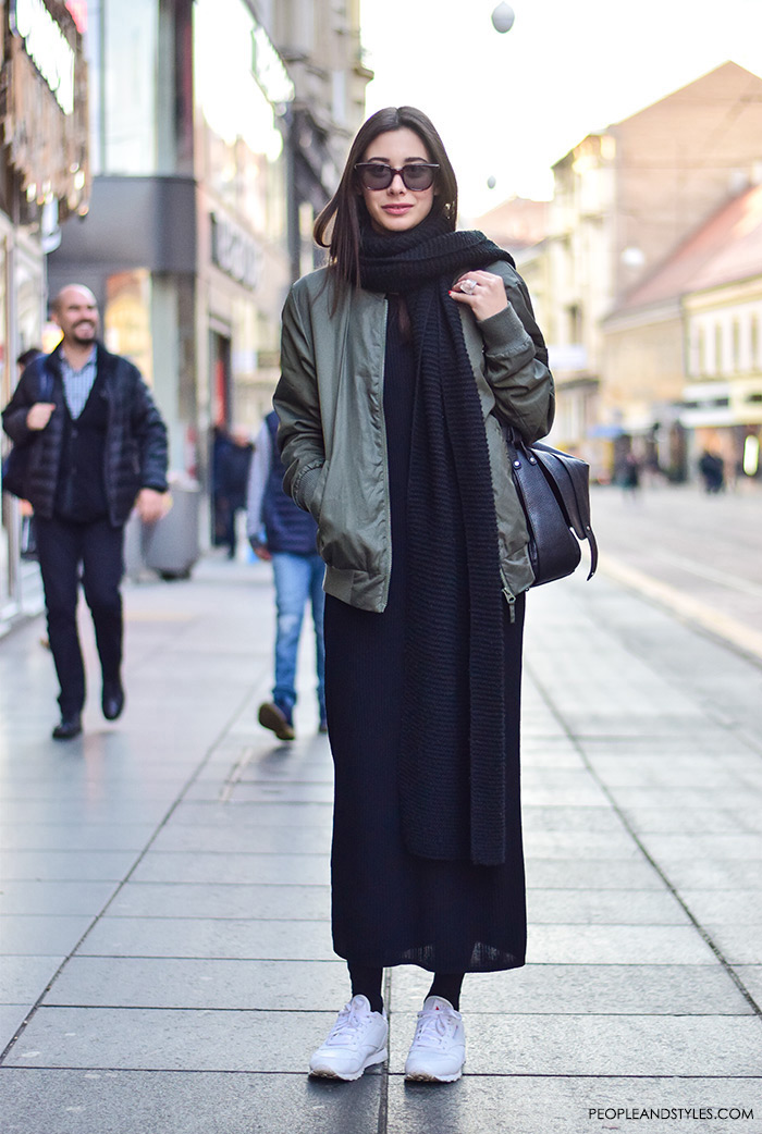 How to wear green bomber jacket, black long dress, long scarf and white sneakers, street style fashion inspiration