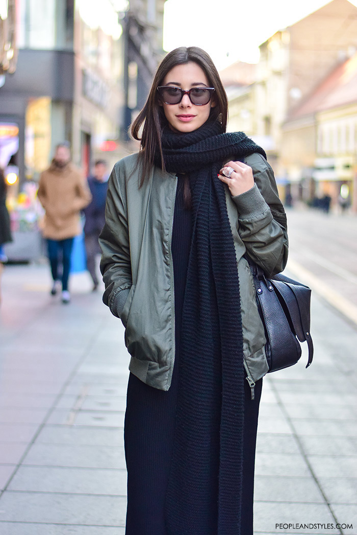 How to wear green bomber jacket, black long dress, long scarf and white sneakers, street style fashion inspiration