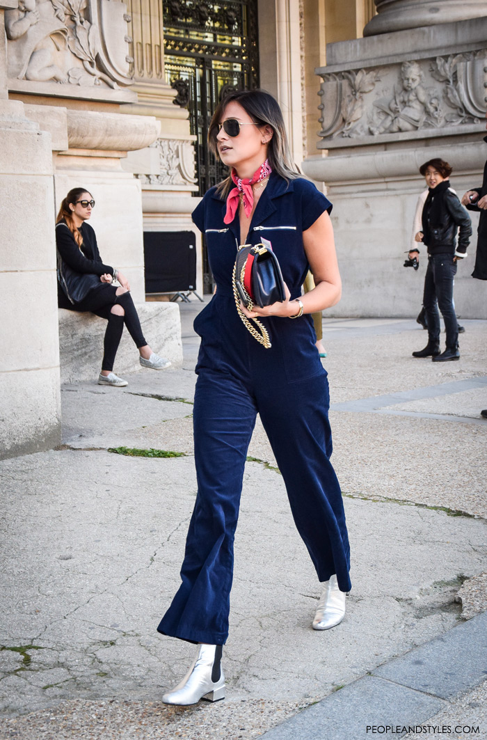 How to style red bandana scarf, street style outfit inspiration, how to style bandana with navy jumpsuite and silver ankle boots, Danielle Bernstein in blue velvet overall, red bandana, We Wore What instagram, pinterest