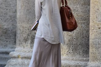 Cool Combo: Midi Skirt and White Sneakers by PeopleandStyles.com