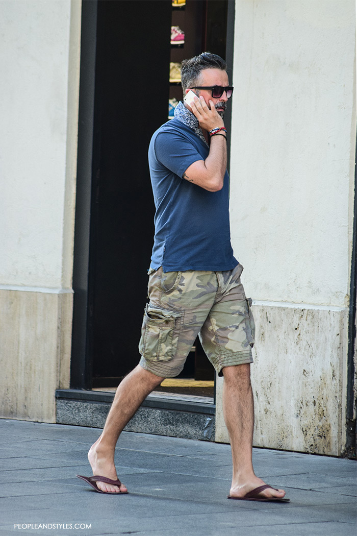 best men casual fashion wear, urban street fashion men, man's fashion street style summer outfit, camo shorts, blue navy polo shirt, flipflops, handsome man