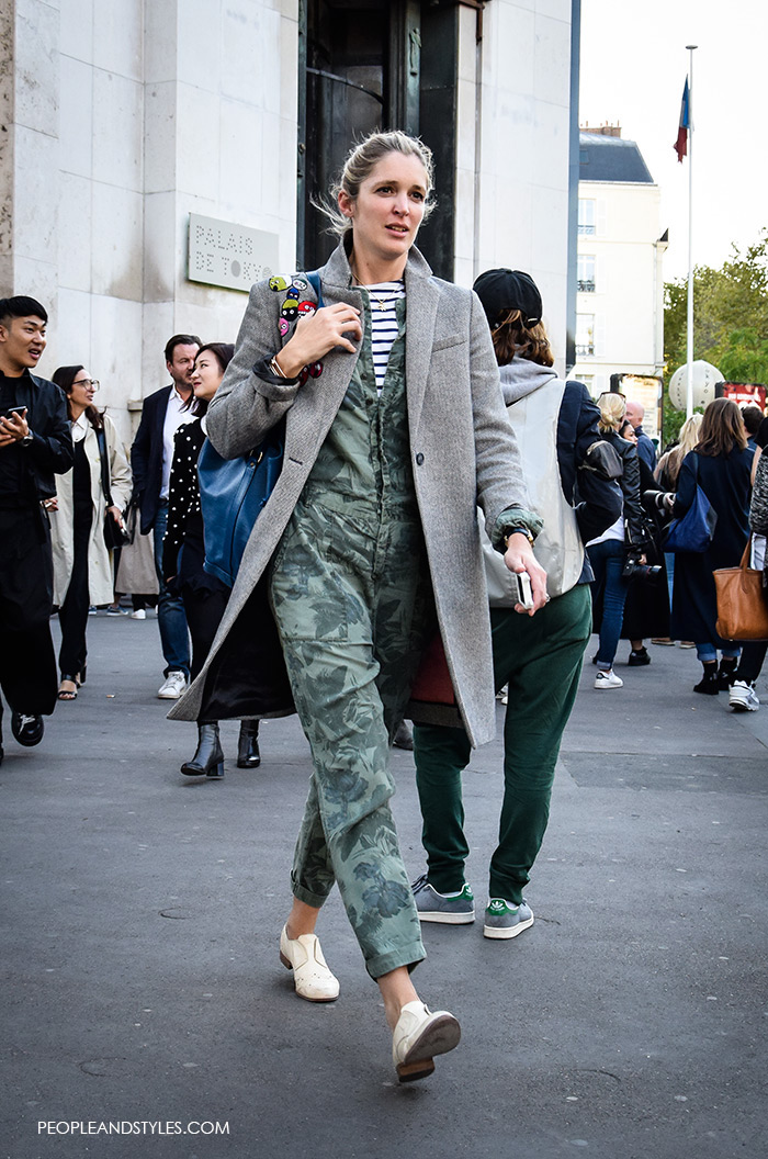 9to5 smart: Jumpsuit and Striped Shirt, green camo jumpsuites, street style women's fashion styling tips what to wear with jumpsuit, grey coat white flat shoes wear to work