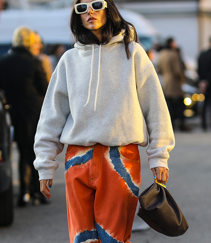 Gilda Ambrosio tie dye boyfriend jeans Alberta Ferretti Spring 2020 Dense fleece bubble hoodie by Alexander Wang The sluchy bag is Gabi by THE VOLON 