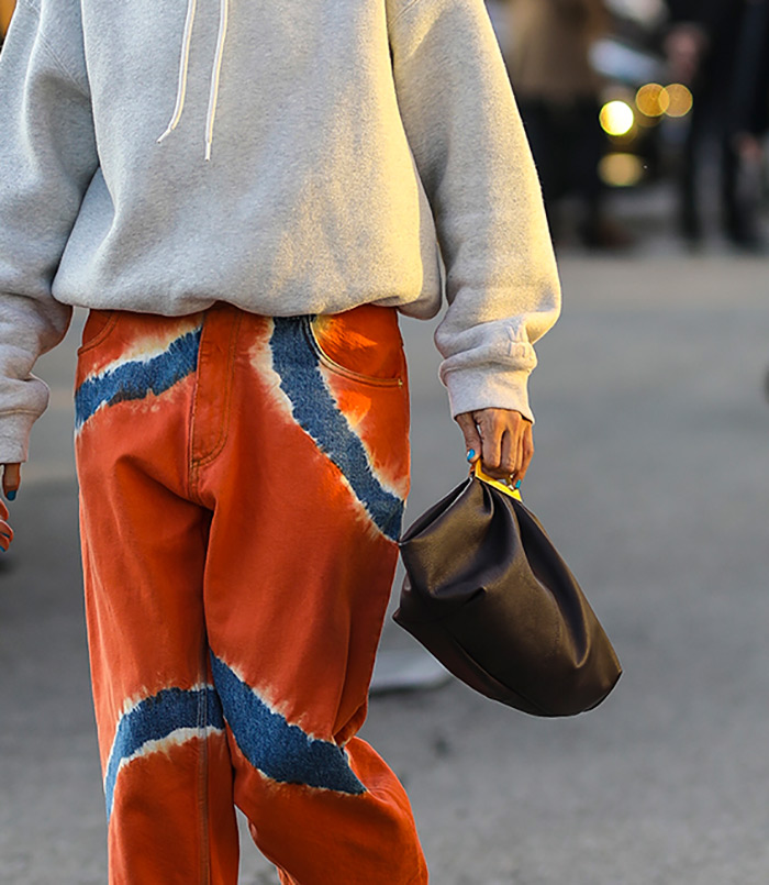 Gilda Ambrosio tie dye boyfriend jeans Alberta Ferretti Spring 2020 Dense fleece bubble hoodie by Alexander Wang The sluchy bag is Gabi by THE VOLON 