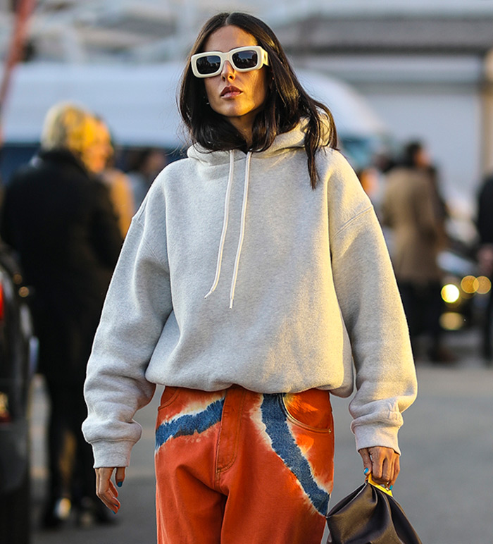 Gilda Ambrosio tie dye boyfriend jeans Alberta Ferretti Spring 2020 Dense fleece bubble hoodie by Alexander Wang The sluchy bag is Gabi by THE VOLON 